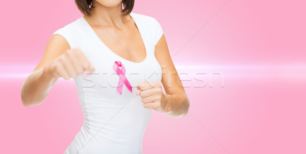 woman with pink cancer awareness ribbon Stock photo © dolgachov