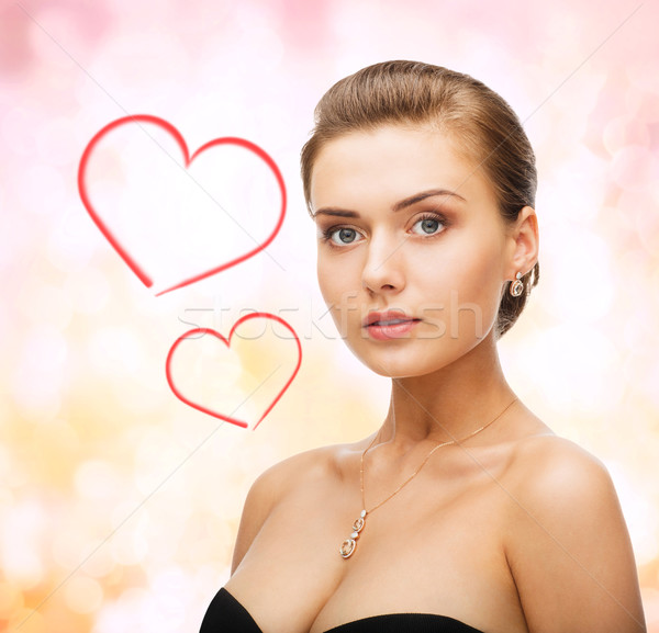 Mujer brillante diamantes pendientes belleza Foto stock © dolgachov