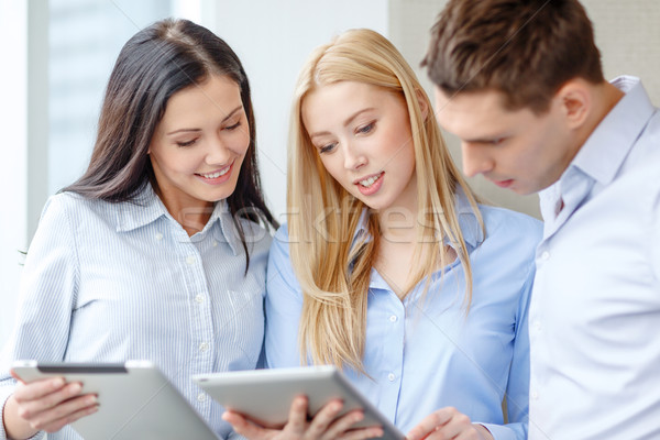 Stock photo: business team working with tablet pcs in office