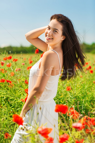 Foto stock: Sorridente · mulher · jovem · papoula · campo · felicidade · natureza