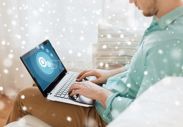 close up of man working with laptop at home Stock photo © dolgachov