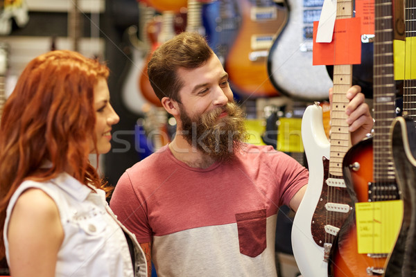 Stockfoto: Paar · muzikanten · gitaar · muziek · store · verkoop