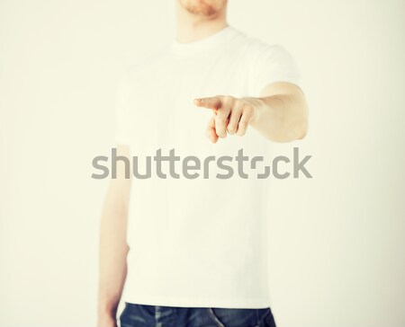 man showing thumbs down Stock photo © dolgachov