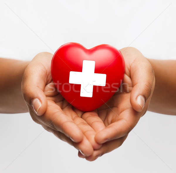 female hands with red heart Stock photo © dolgachov