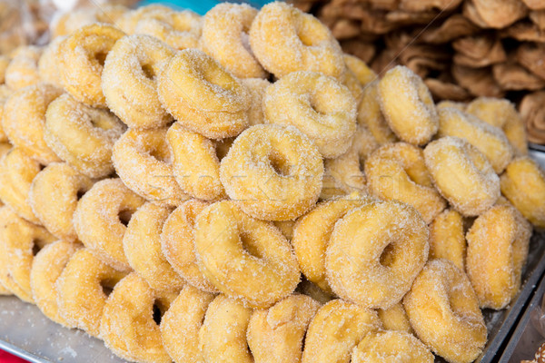 sugared donuts at asian street market Stock photo © dolgachov