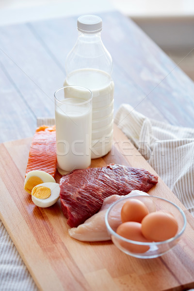 close up of natural protein food on wooden table Stock photo © dolgachov