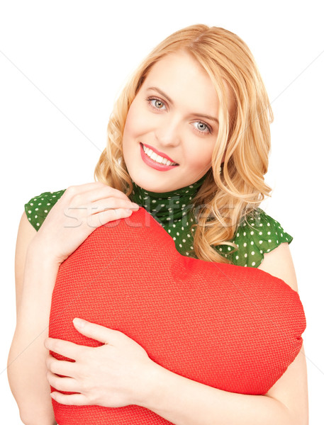 woman with red heart-shaped pillow Stock photo © dolgachov