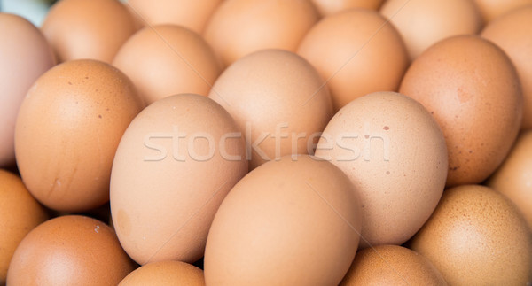 fresh eggs on tray at market Stock photo © dolgachov