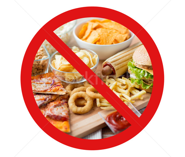 close up of fast food snacks behind no symbol Stock photo © dolgachov