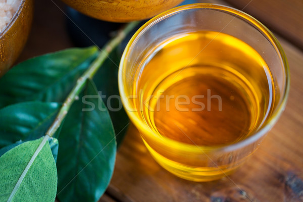 Mel vidro folhas madeira Foto stock © dolgachov