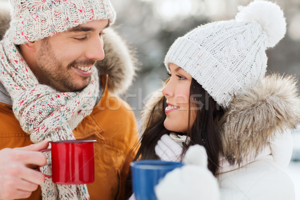 Feliz Pareja tazas de té invierno paisaje personas Foto stock © dolgachov