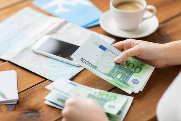 close up of traveler hands counting euro money Stock photo © dolgachov