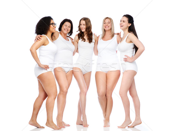 Grupo feliz diferente mulheres branco roupa interior Foto stock © dolgachov