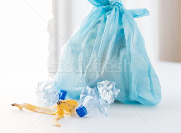close up of rubbish bag with trash at home Stock photo © dolgachov