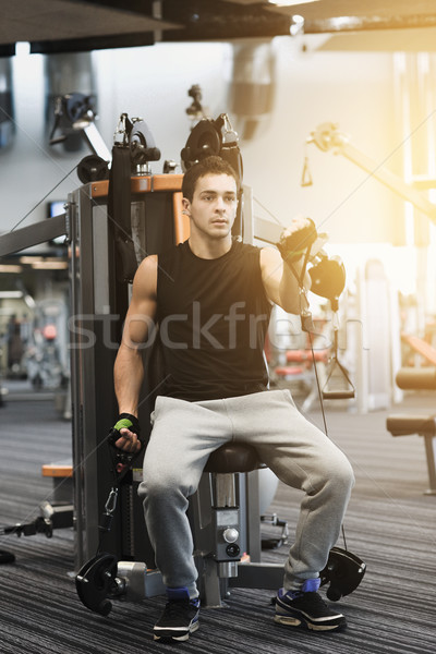 человека спортзал машина спорт фитнес Сток-фото © dolgachov