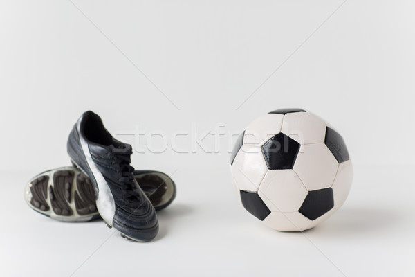 close up of soccer ball and football boots Stock photo © dolgachov
