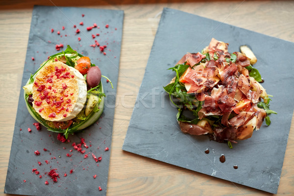 Queso de cabra jamón piedra placas alimentos culinario Foto stock © dolgachov