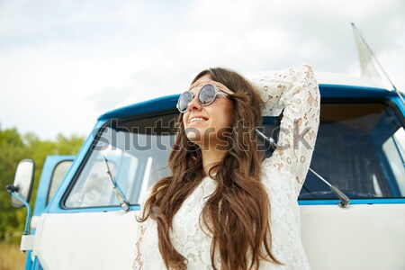 Stock photo: happy hippie woman showing peace in minivan car