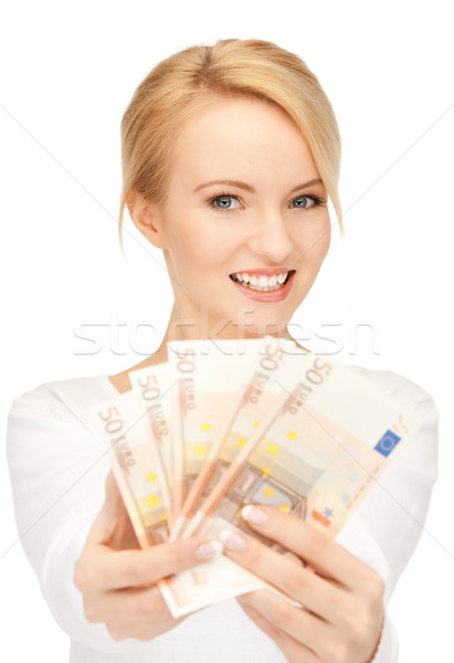 женщину евро наличных деньги фотография бизнеса Сток-фото © dolgachov
