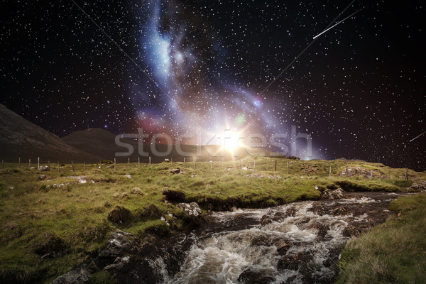 landscape over space and galaxy in night sky Stock photo © dolgachov