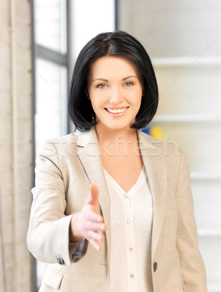 woman with an open hand ready for handshake Stock photo © dolgachov