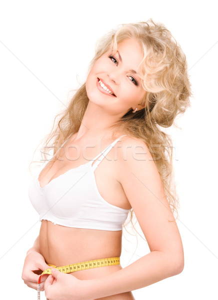 Jovem bela mulher fita métrica branco mulher sensual Foto stock © dolgachov