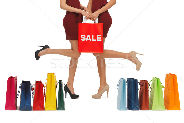 long legs with shopping bags Stock photo © dolgachov