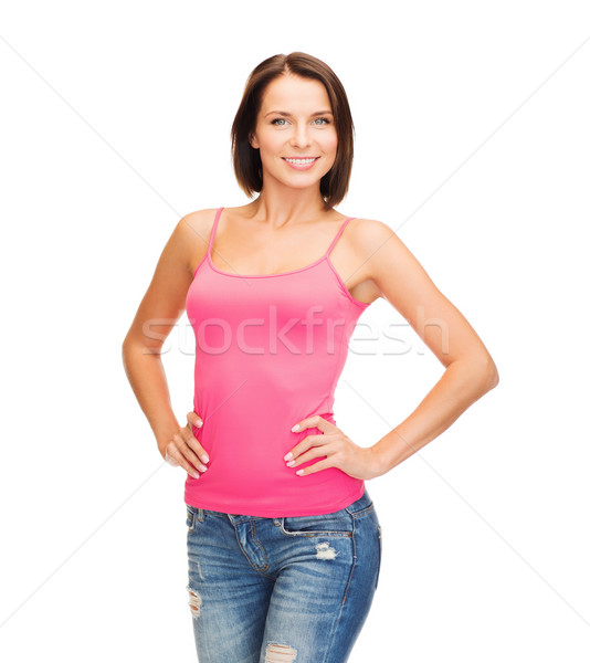 Kobieta różowy zbiornika górę projektu uśmiechnięta kobieta Zdjęcia stock © dolgachov