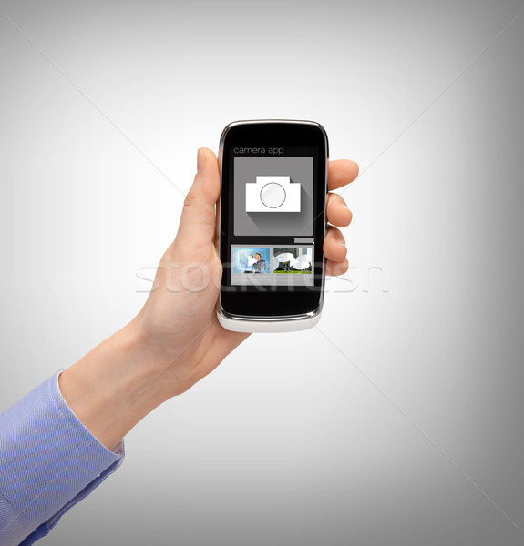 Mano smartphone applicazione business futuro Foto d'archivio © dolgachov