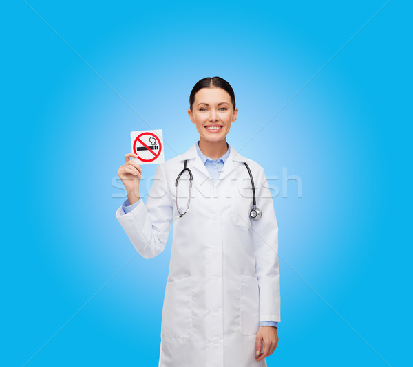 Lächelnd weiblichen Arzt halten Zeichen Stock foto © dolgachov
