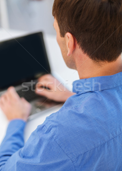 close up of man with laptop computer Stock photo © dolgachov