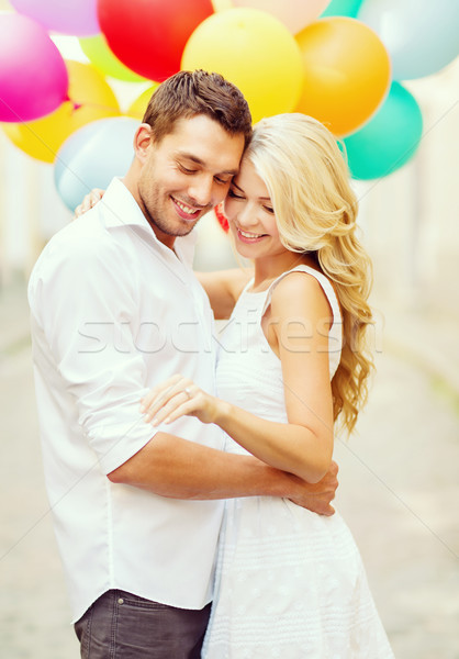 Pareja colorido globos verano vacaciones celebración Foto stock © dolgachov