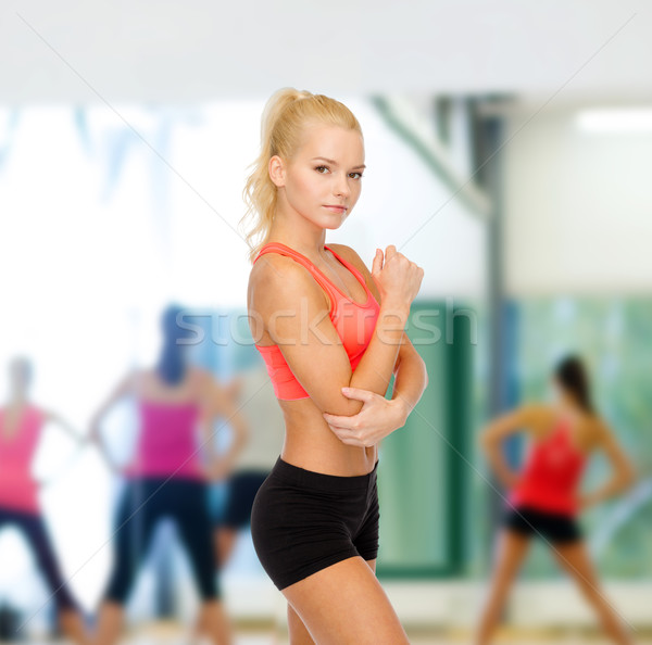 женщину более локоть здравоохранения фитнес Сток-фото © dolgachov