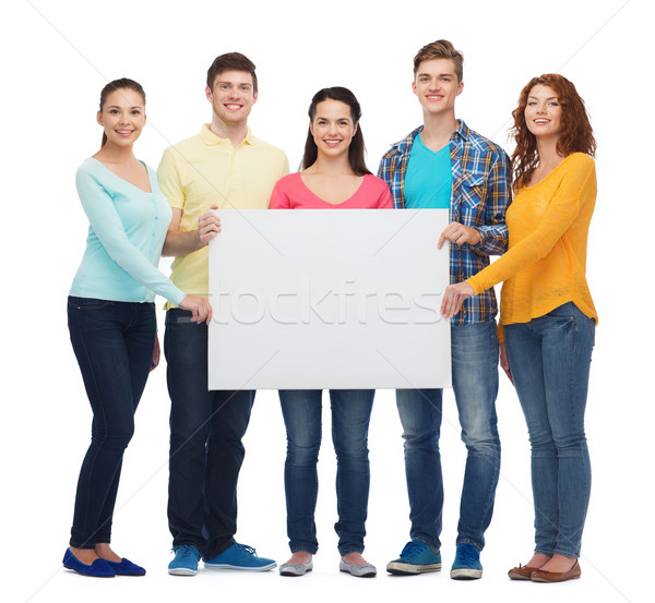 group of smiling teenagers Stock photo © dolgachov