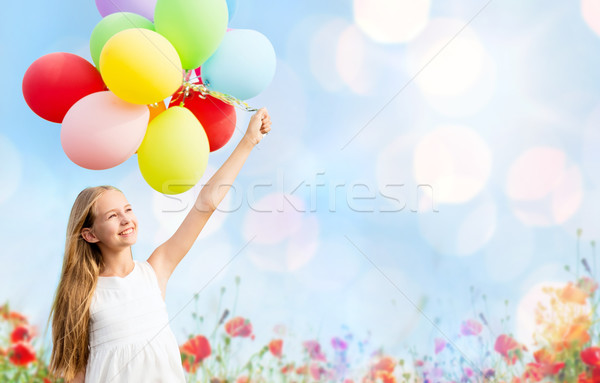 happy girl with colorful balloons Stock photo © dolgachov