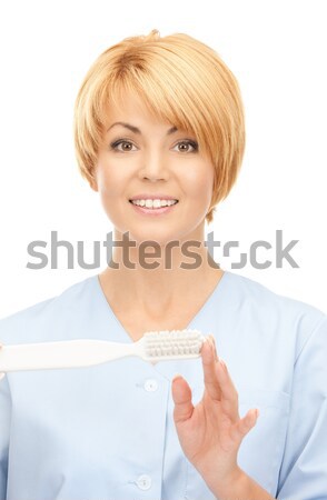 Stock photo: woman with an open hand ready for handshake