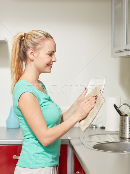 Imagine de stoc: Fericit · femeie · bucate · acasă · bucătărie · oameni