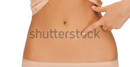 Femeie îndreptat deget burtă sănătate digestie Imagine de stoc © dolgachov