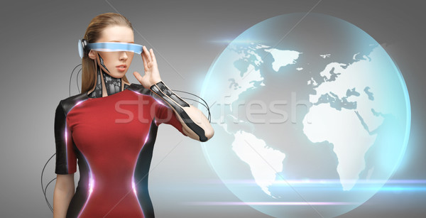 woman with futuristic glasses and sensors Stock photo © dolgachov