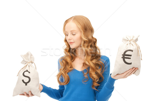 [[stock_photo]]: Femme · euros · dollar · sacs · photos · argent