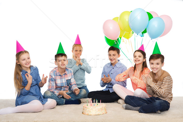 Heureux enfants fête gâteau d'anniversaire enfance [[stock_photo]] © dolgachov