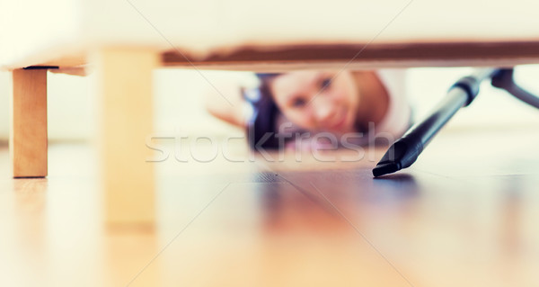 close up of woman with vacuum cleaner at home Stock photo © dolgachov