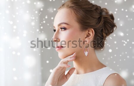 Belle femme visage boucle beauté bijoux Photo stock © dolgachov