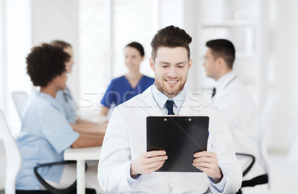 Feliz médico equipo clínica profesión Foto stock © dolgachov