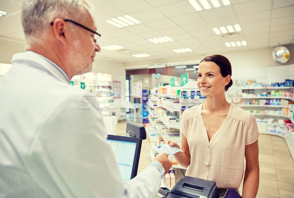 Stockfoto: Vrouw · geld · apotheker · drogist · geneeskunde · gezondheidszorg