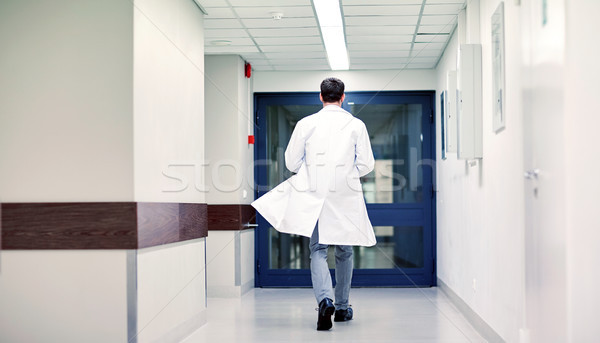 Stock photo: medic or doctor walking along hospital corridor