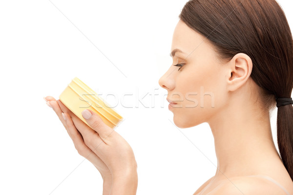 beautiful woman with moisturizing creme Stock photo © dolgachov