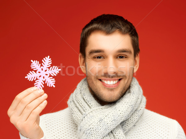 man in warm sweater and scarf with snowflake Stock photo © dolgachov