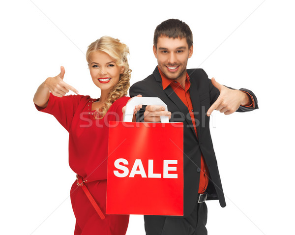 Homem mulher bolsa de compras brilhante quadro menina Foto stock © dolgachov