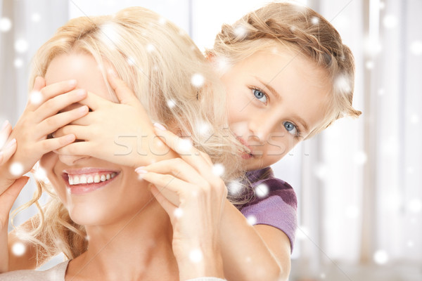 mother and daughter making a joke Stock photo © dolgachov